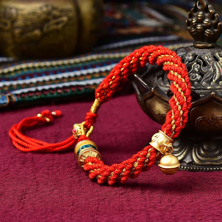 Bracelet tibétain fait main avec breloque en corde tressée et roue de prière Thangka pour protection de la chance
