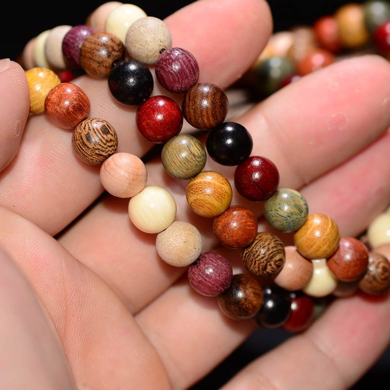 Bracelet de méditation et de bénédiction Mala en bois de wengé avec 108 perles de Buddha Stones