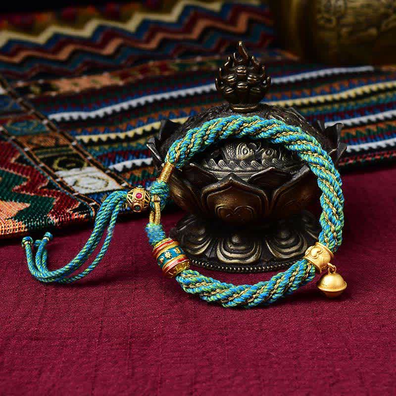 Bracelet tibétain fait main avec breloque en corde tressée et roue de prière Thangka pour protection de la chance