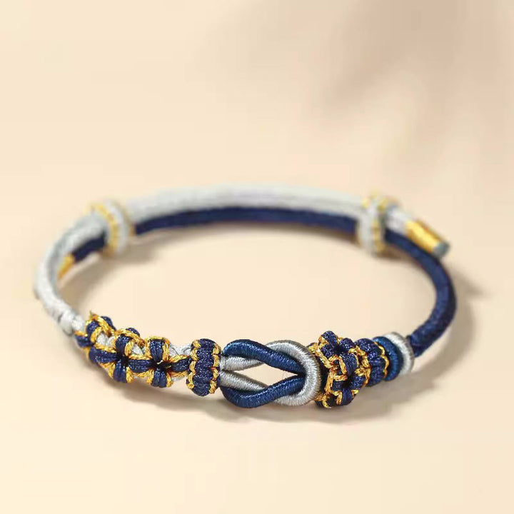 Bracelet de protection porte-bonheur fait main en Buddha Stones avec nœud en fleur de pêcher à huit fils