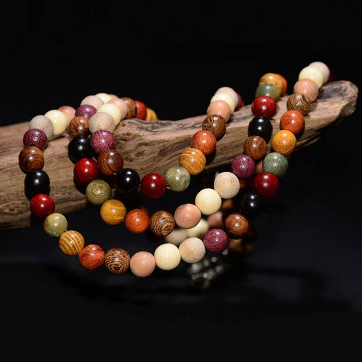Bracelet de méditation et de bénédiction Mala en bois de wengé avec 108 perles de Buddha Stones