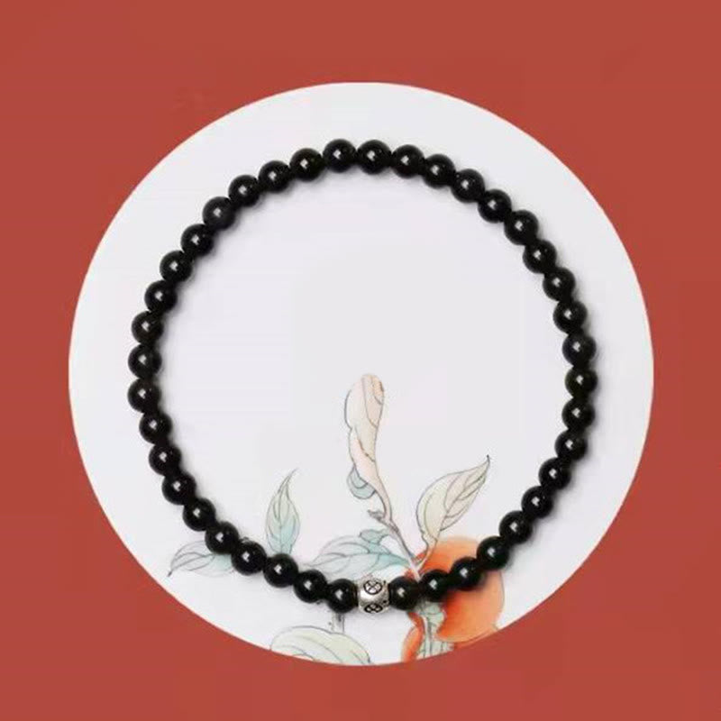 Bracelet de force de purification en obsidienne noire naturelle et quartz fumé de Buddha Stones