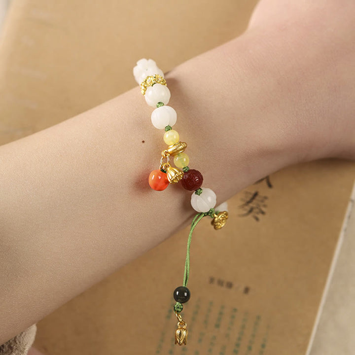 Bracelet d'harmonie et de paix en perles de citrouille et de lotus en Buddha Stones naturelles