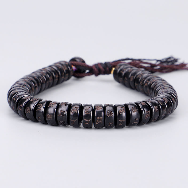 Bracelet en corde Buddha Stones perles de noix de coco tibétaines gravées avec le mantra positif Om Mani Padme Hum