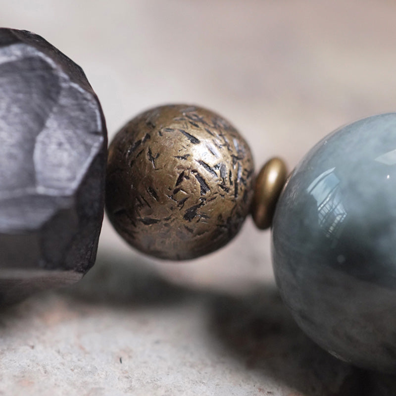 Bracelet de couple en cuivre et bois d'ébène avec pierre œil d'aigle et Buddha Stones