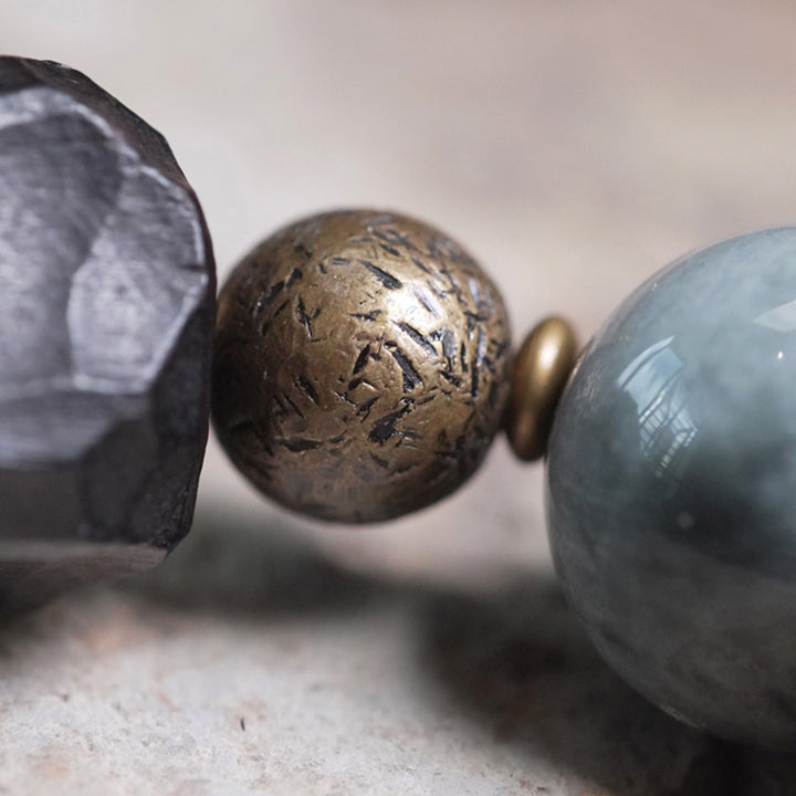 Bracelet de couple en cuivre et bois d'ébène avec pierre œil d'aigle et Buddha Stones