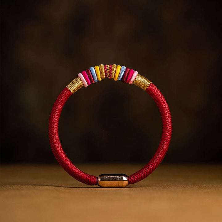 Bracelet tressé à boucle magnétique en Buddha Stones tibétaines fait à la main avec protection des nœuds King Kong