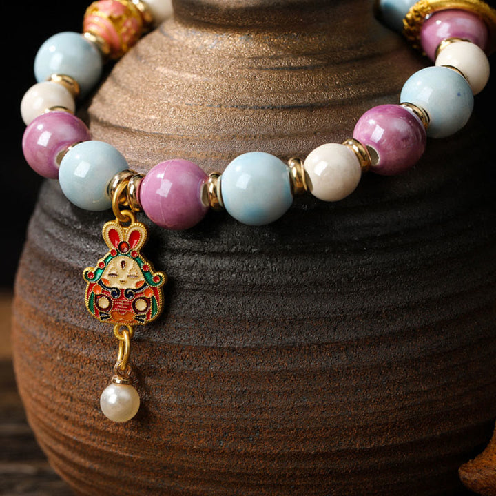 Buddha Stones Tibétain Zakiram Déesse de la Richesse Lapin Tête de Lion Charme Liuli Verre Encens Cendres Perle de Porcelaine Bracelet de Protection