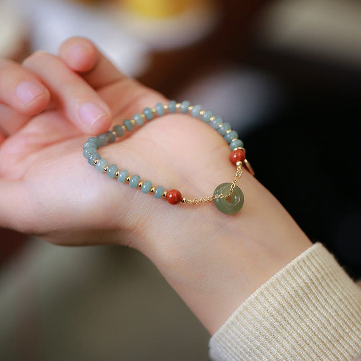 Bracelet porte-bonheur en Buddha Stones naturel Hetian et agate rouge avec boucle de paix