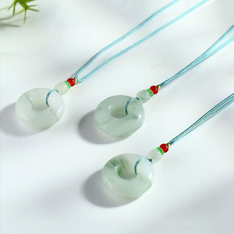 Collier pendentif en jade naturel avec boucle de paix et de prospérité en Buddha Stones