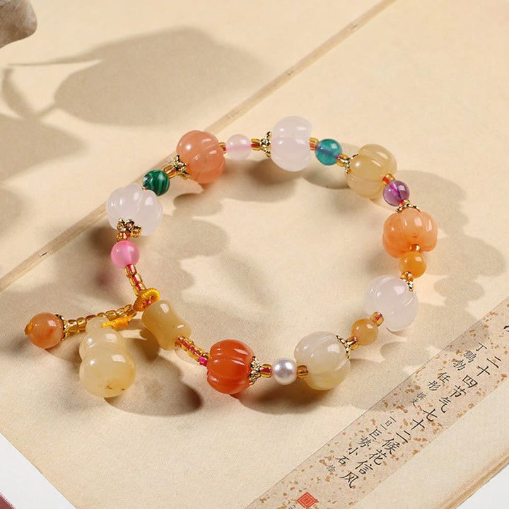 Bracelet à breloques en perles de citrouille Pixiu en soie dorée naturelle et cristaux de jade