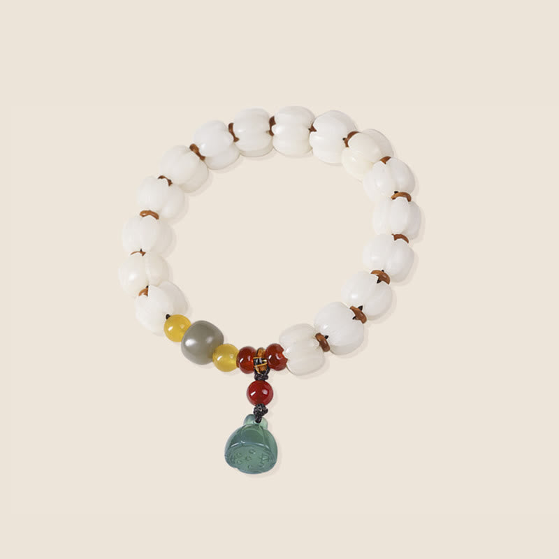 Bracelet en perles de citrouille gravées en agate rouge Bodhi Calme Harmonie Bodhi Graines naturelles Lotus