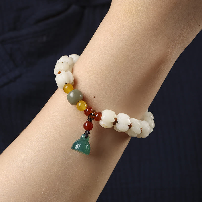 Bracelet en perles de citrouille gravées en agate rouge Bodhi Calme Harmonie Bodhi Graines naturelles Lotus