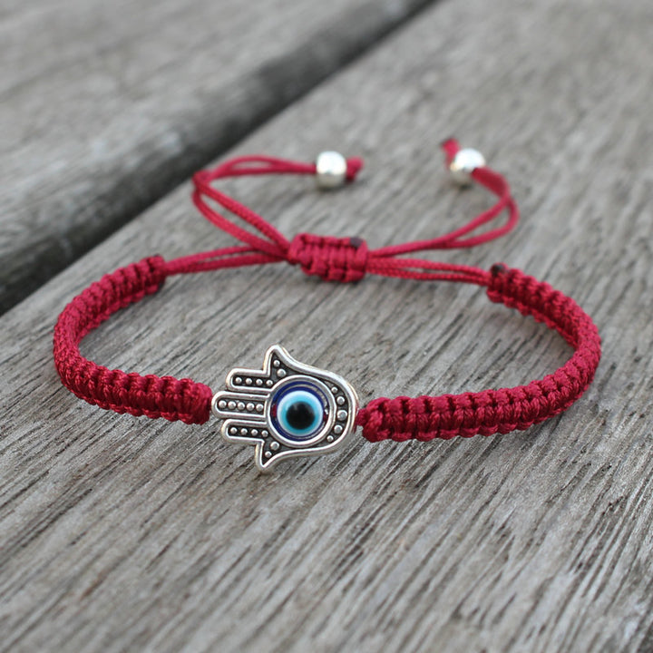 Bracelet en corde fait main avec symbole Hamsa et Buddha Stones