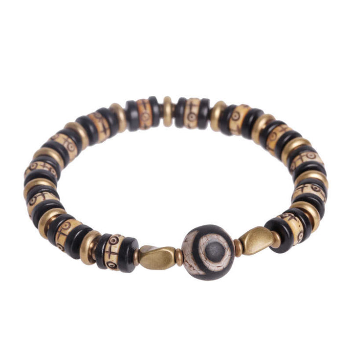 Bracelet de force en bois d'ébène et perles d'os tibétaines en Buddha Stones