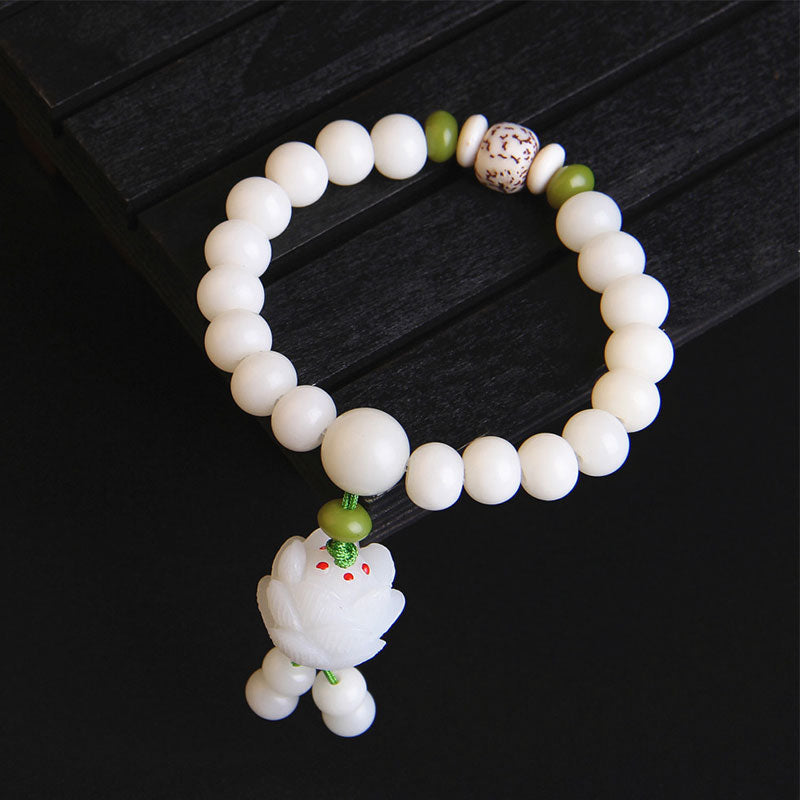 Bracelet porte-bonheur en Buddha Stones et lotus blanc naturel