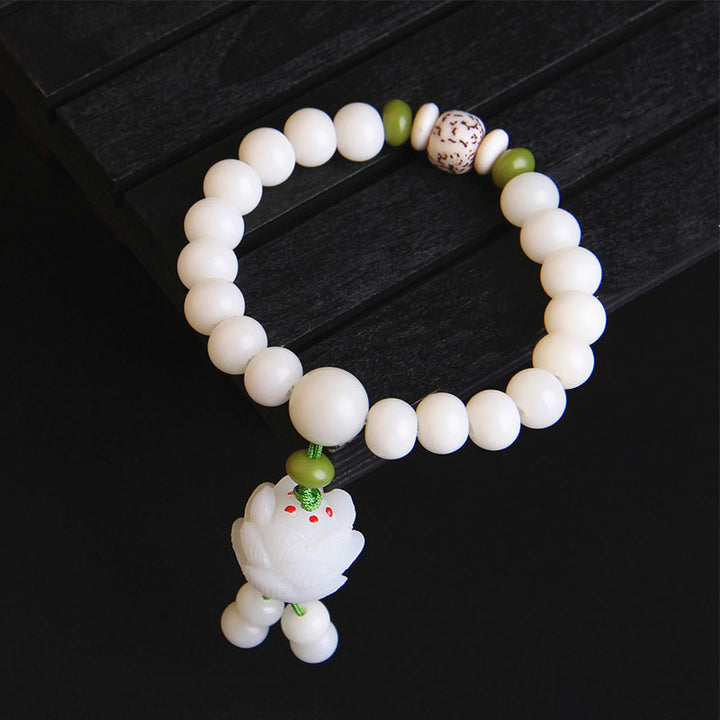Bracelet porte-bonheur en Buddha Stones et lotus blanc naturel