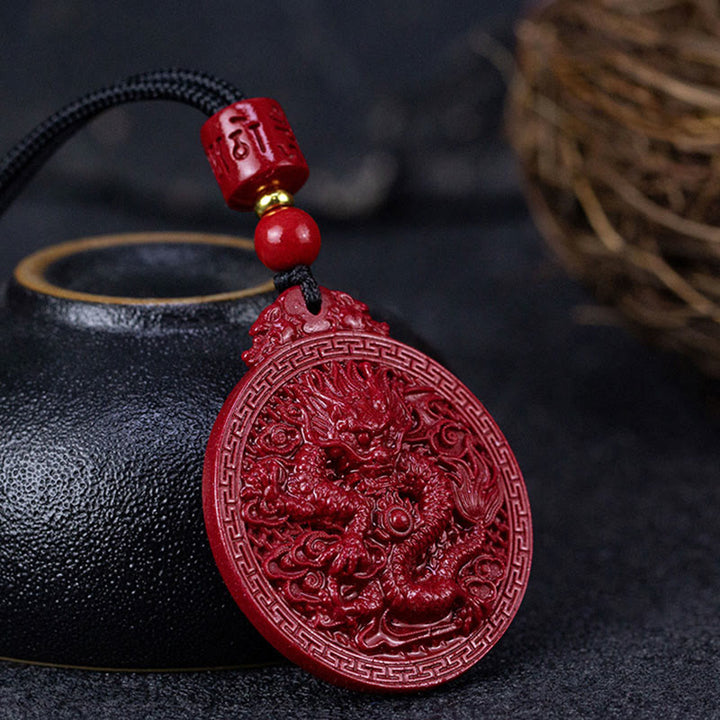 Collier pendentif de protection du dragon en cinabre naturel de l'année du dragon Buddha Stones