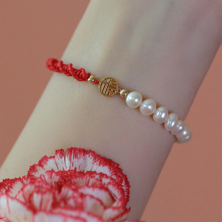 Bracelet tressé en fil rouge avec perles de protection et de chance plaquées or 14 carats