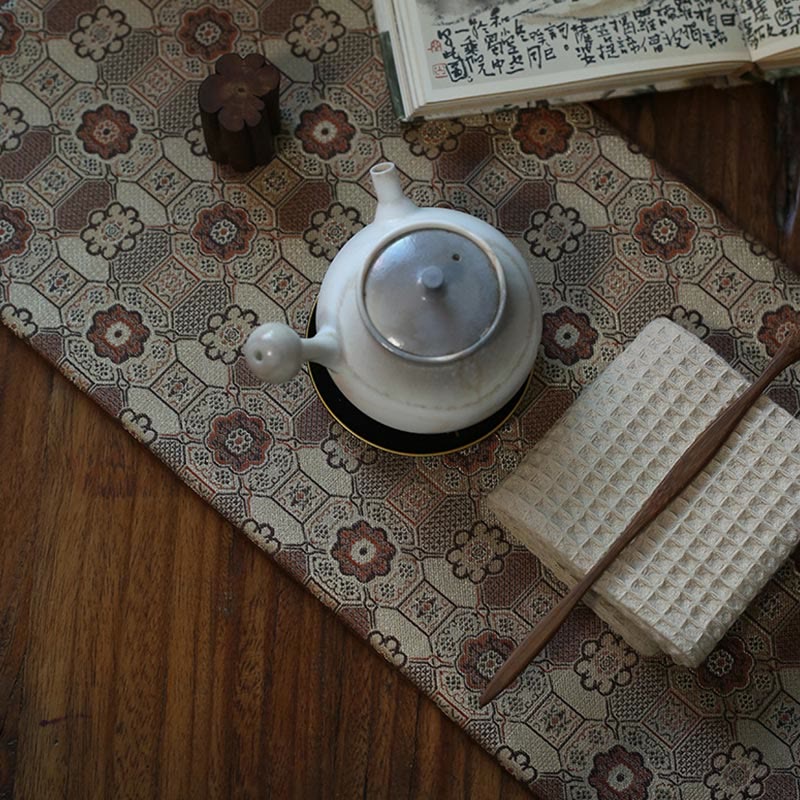 Dessous de verre élégant à motif de brocart floral pour tasse à thé