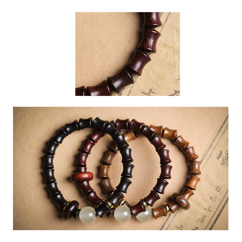 Bracelet de paix en bambou et bois de santal vert et ébène avec Buddha Stones