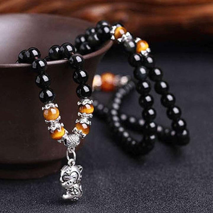 Bracelet Mala porte-bonheur en obsidienne noire et œil de tigre avec 108 perles du zodiaque chinois