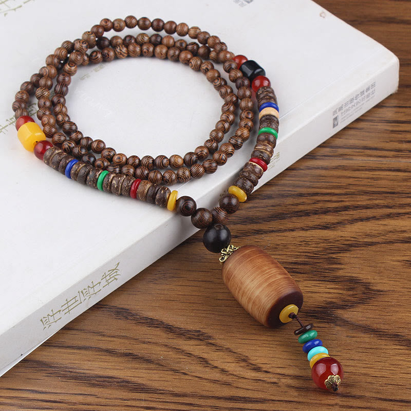 Collier pendentif en Buddha Stones tibétain en bois de wengé Bodhi Seed Agate Balance Peace