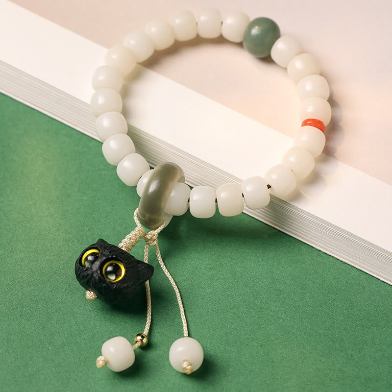 Bracelet en Buddha Stones en graines de Bodhi naturelles en bois noir africain avec joli chat et breloque pour la paix et l'harmonie - image 2