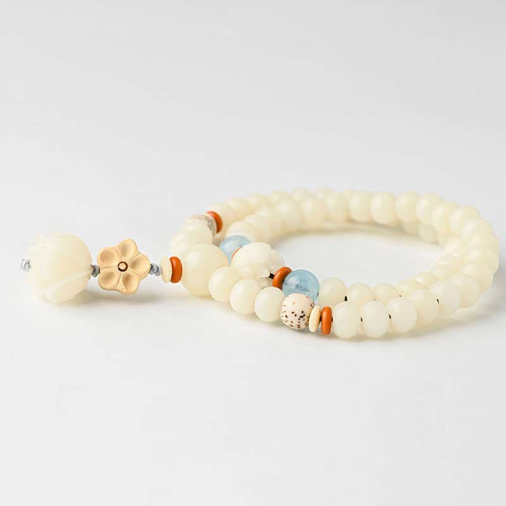 Bracelet de bénédiction Bodhi Lotus en jade blanc tibétain Buddha Stones