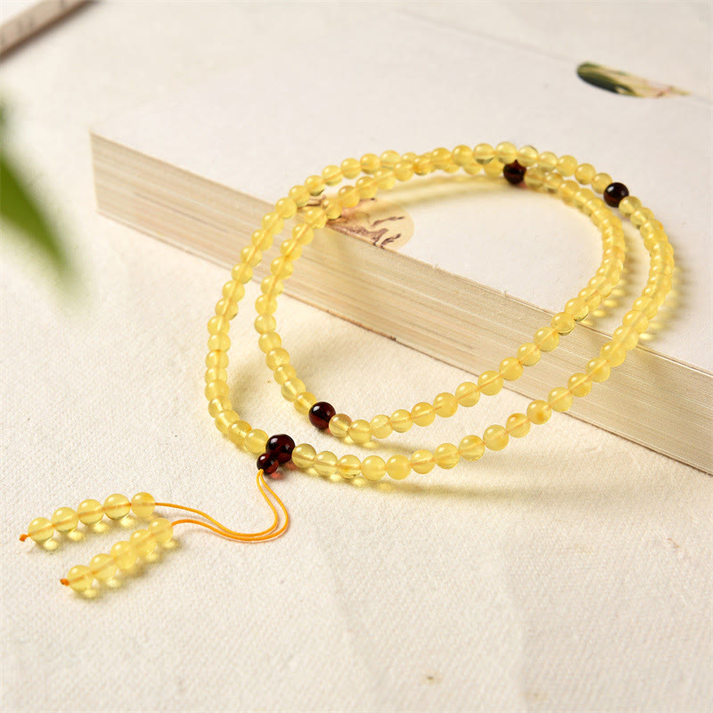 Bracelet Mala Buddha Stones 108 perles en ambre naturel transparent pour l'anxiété