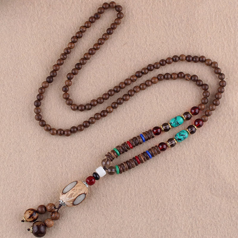 Collier pendentif protection éléphant en Buddha Stones tibétain en bois de wengé Bodhi Seed Agate