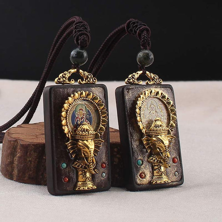 Collier avec pendentif en corde représentant un éléphant en bois d'ébène, dieu de la fortune et de la bénédiction du Bouddha