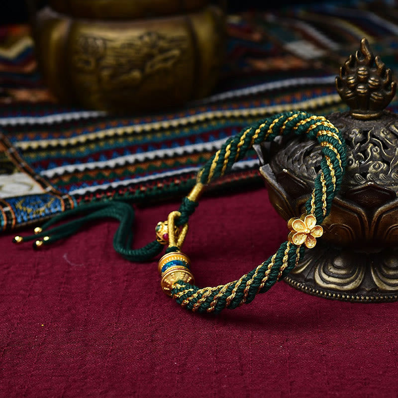 Bracelet en corde tissée avec breloque en forme de fleur et roue de prière en Buddha Stones faites à la main avec cinq dieux de la richesse et de la chance