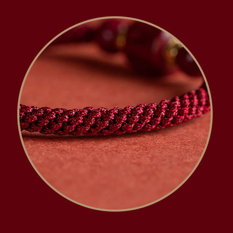 Bracelet tressé avec Buddha Stones tibétaines en cinabre Om Mani Padme Hum gravé et bénédiction