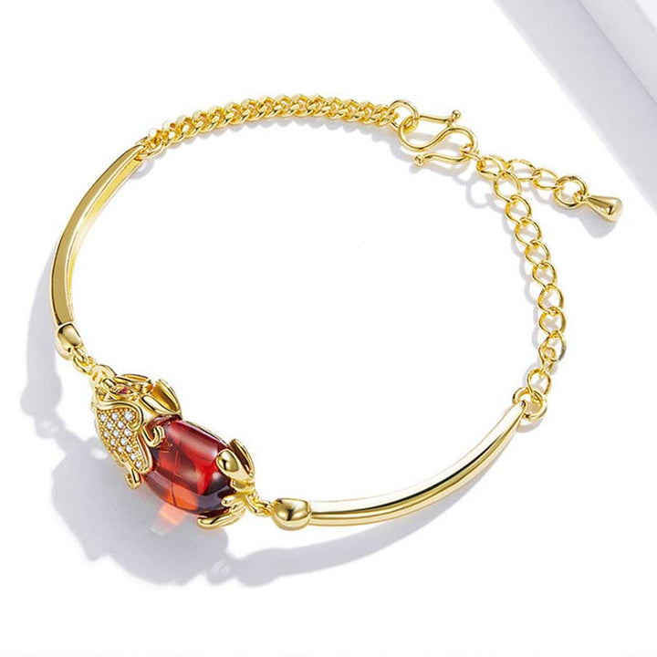 Bracelet Feng Shui en agate rouge dorée PiXiu pour la richesse et la chance