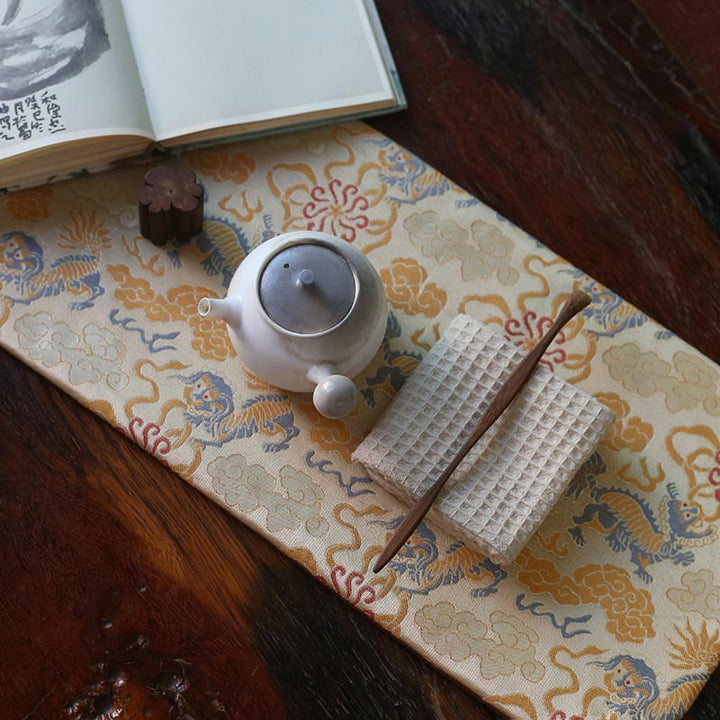 Dessous de verre élégant à motif de brocart floral pour tasse à thé