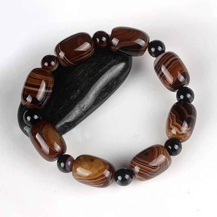 Bracelet de courage et de bonheur en sardonyx naturel Buddha Stones
