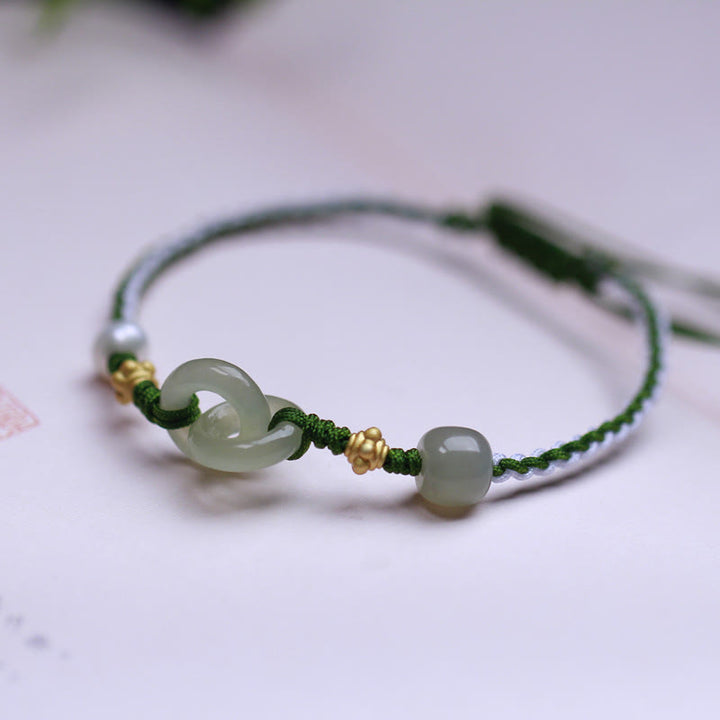 Bracelet tressé porte-bonheur en argent sterling 925 avec double boucle de paix et jade Hetian de Buddha Stones