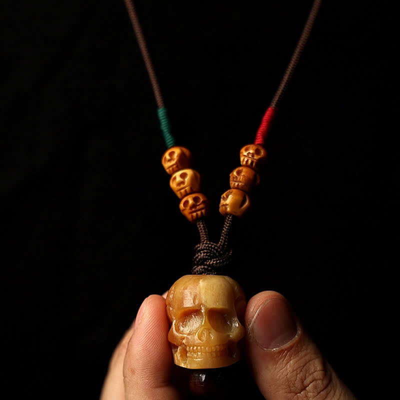 Collier pendentif en os de chameau tibétain Buddha Stones et crâne du Seigneur des cadavres