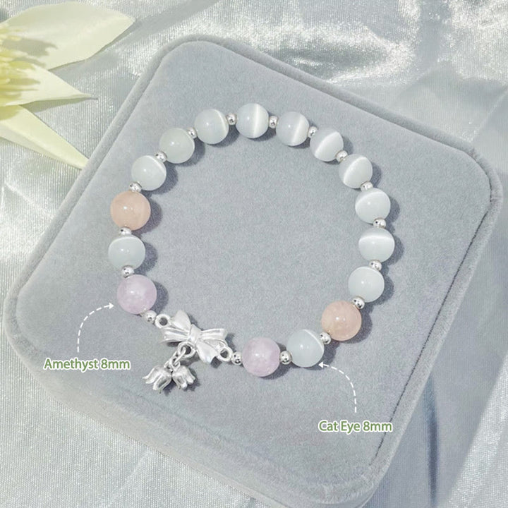Bracelet à breloques en forme de rosette avec œil de chat, lavande et améthyste de Buddha Stones