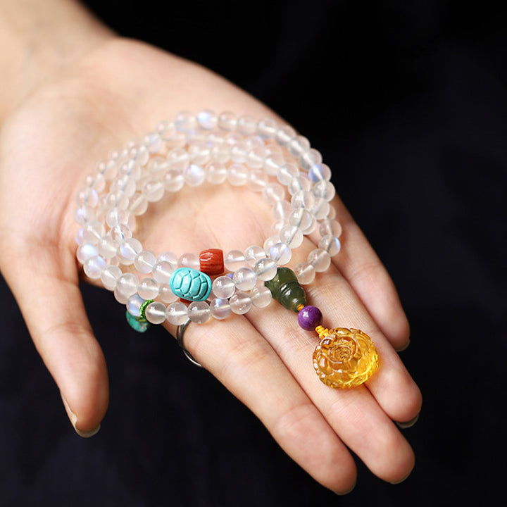 Bracelet de guérison en cristal de 108 Buddha Stones de Mala en pierre de lune, ambre, lotus, turquoise