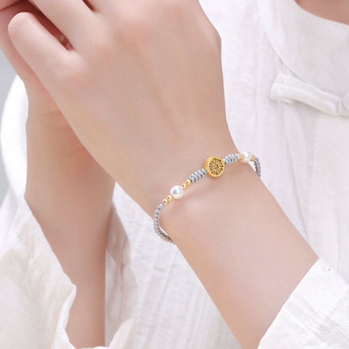 Bracelet tressé en corde bleue avec perles et arbre de fortune en cuivre et Buddha Stones