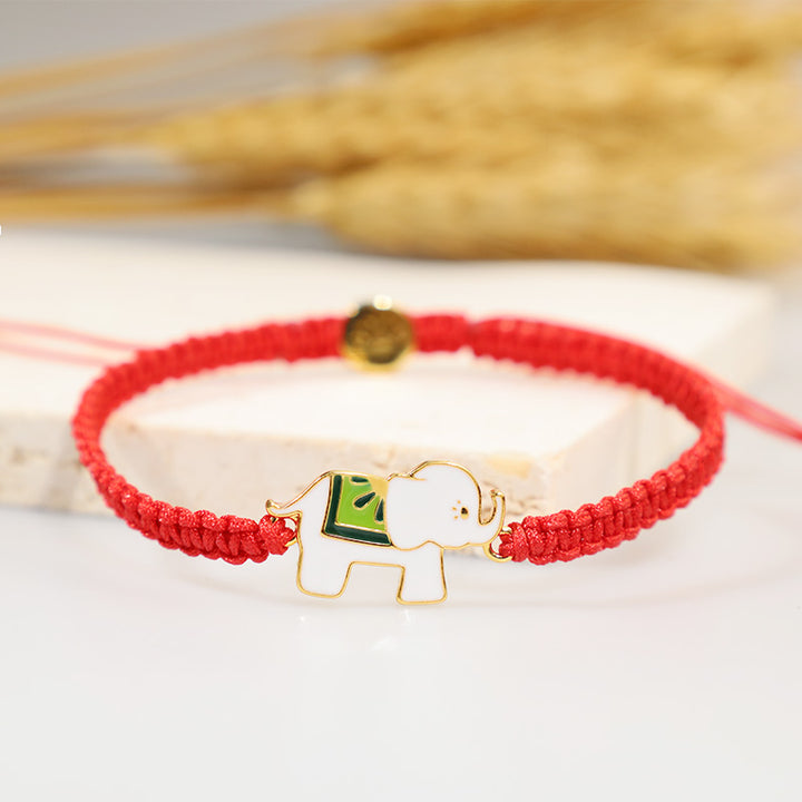 Bracelet tibétain en argent sterling 925 fait main avec des Buddha Stones et un éléphant porte-bonheur rouge