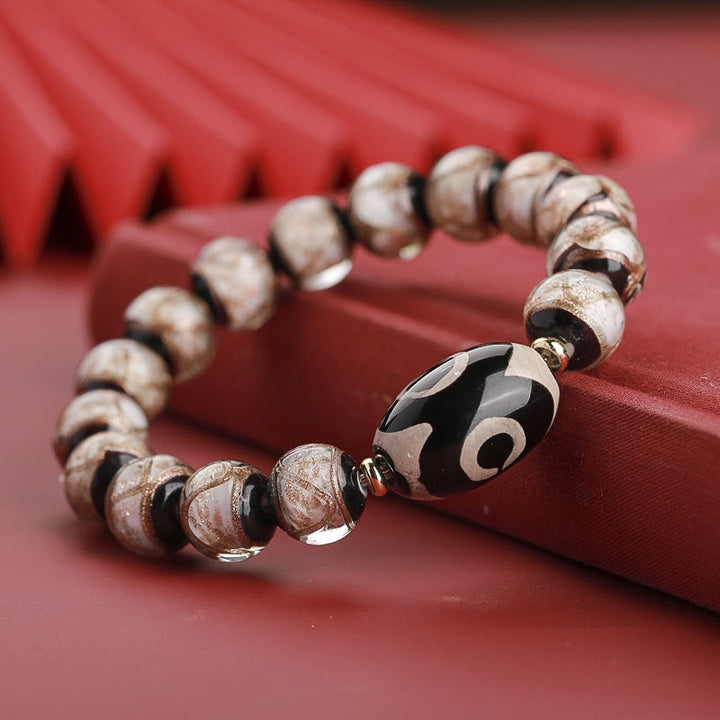 Buddha Stones Perle Dzi tibétaine à neuf yeux Perle Dzi à trois yeux Bracelet de richesse en perles de verre Liuli