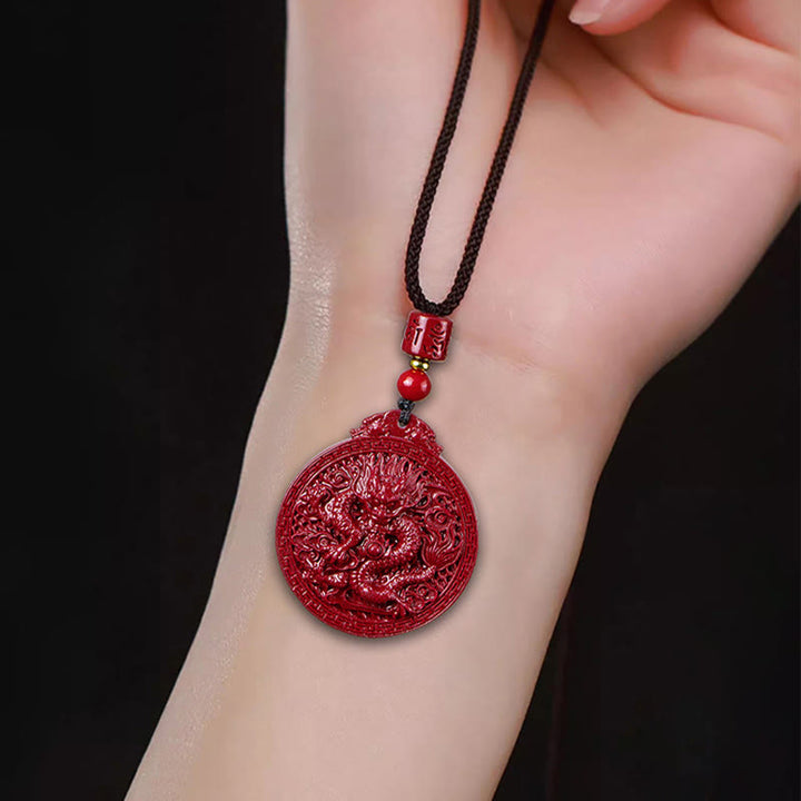 Collier pendentif de protection du dragon en cinabre naturel de l'année du dragon Buddha Stones