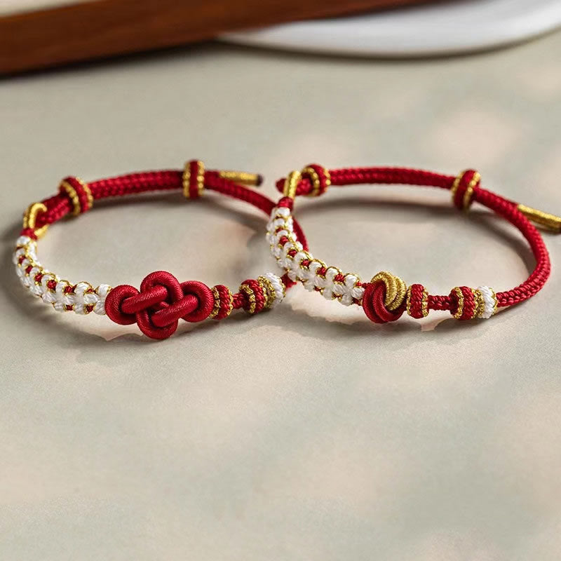 Bracelet porte-bonheur en corde avec breloque en fleur de pêcher et nœud d'amour véritable fait à la main par Buddha Stones