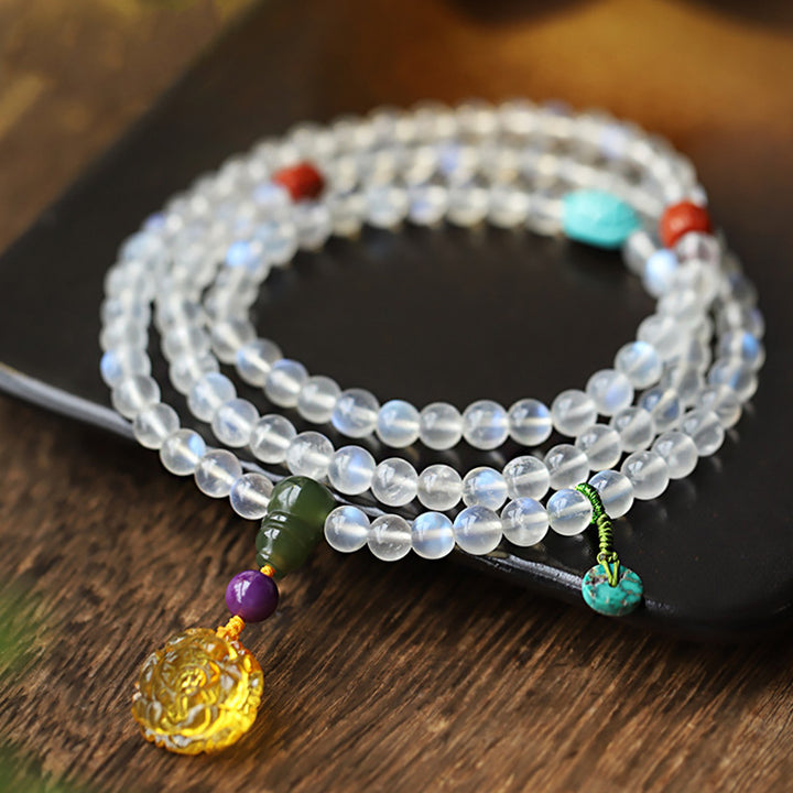 Bracelet de guérison en cristal de 108 Buddha Stones de Mala en pierre de lune, ambre, lotus, turquoise