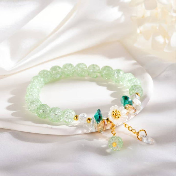 Bracelet en perles de verre à breloques en forme de fleur Buddha Stones au design simple