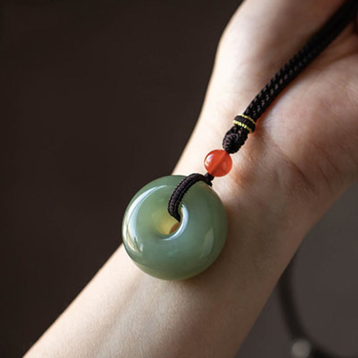 Collier avec pendentif en jade rond naturel et Buddha Stones, boucle de paix, lotus d'abondance - image 11