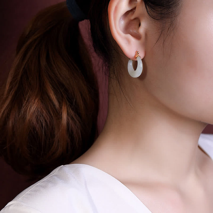 Boucles d'oreilles pendantes en jade cyan avec Buddha Stones rondes pour la prospérité et la chance